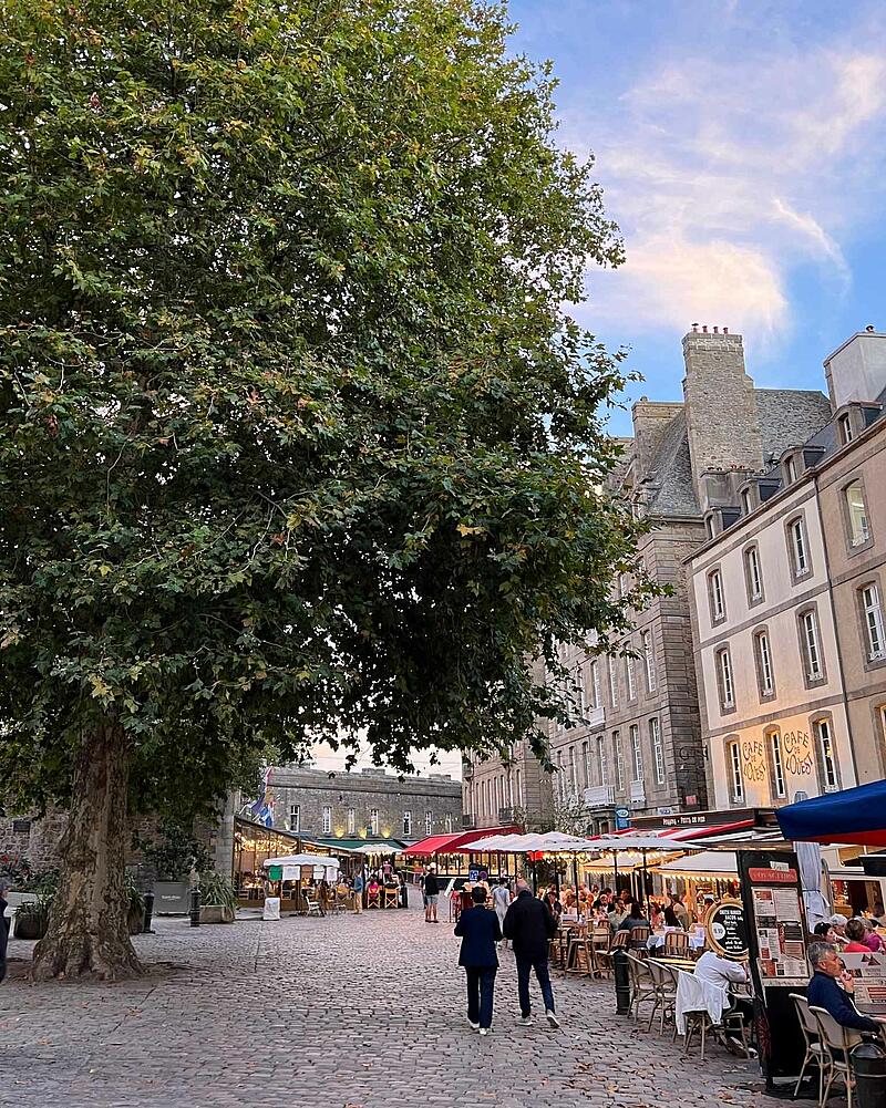 Lively café terraces inside Saint-Malo walled city near Les Castels campsites